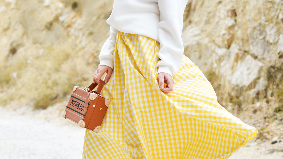 Frescura y Estilo: Guía para Combinar tu Falda Midi en la Temporada Primaveral