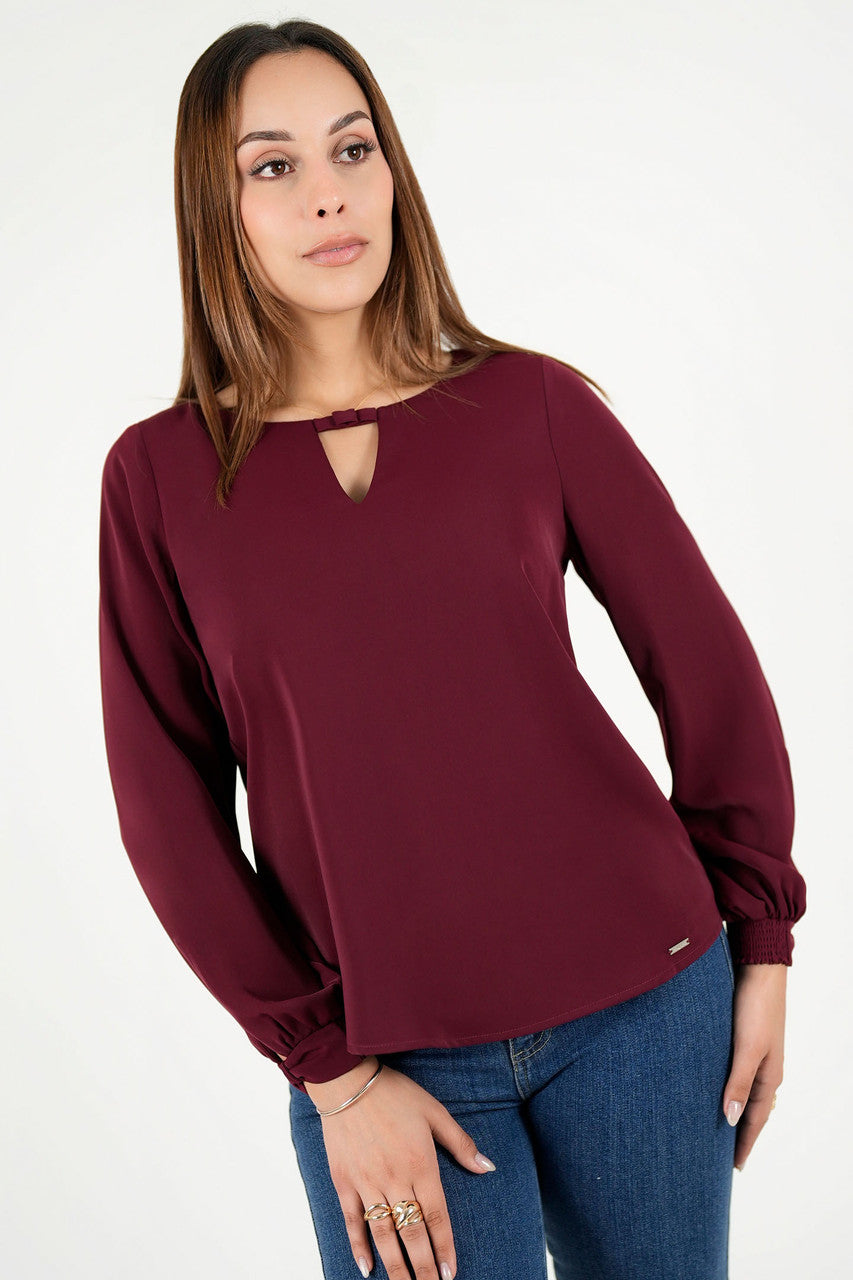 Blusa manga larga en seda con escote ojal