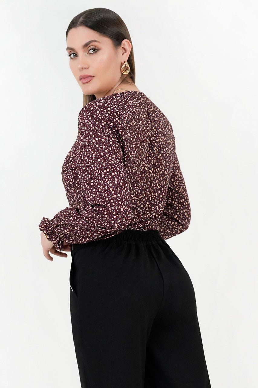 Blusa manga larga en seda corrugada con escote V