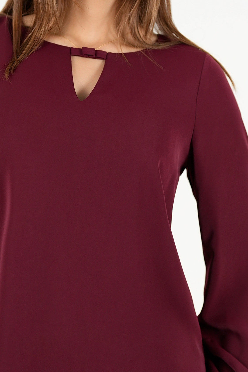Blusa manga larga en seda con escote ojal