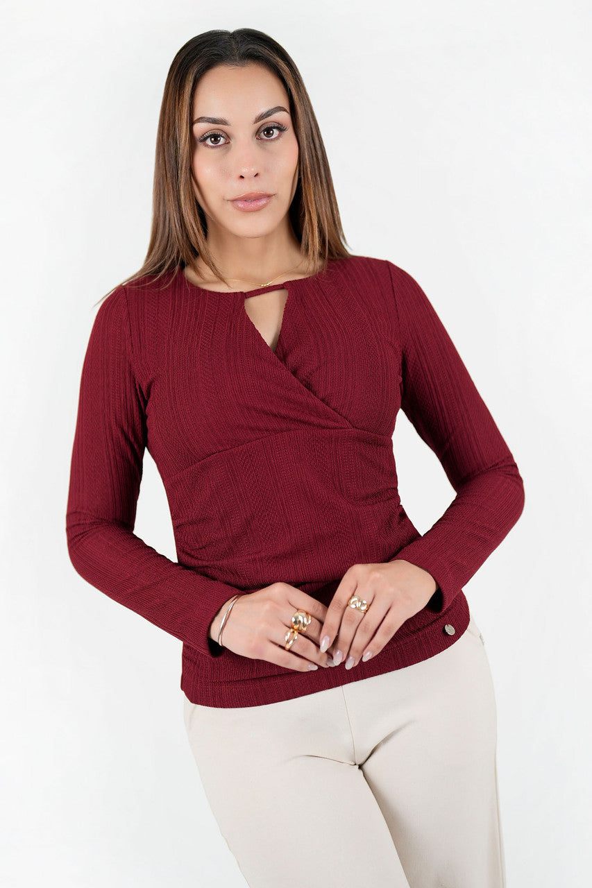 Polo manga larga en jacquard labrado