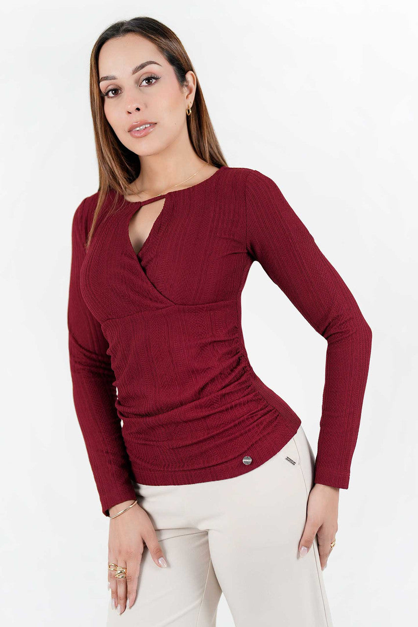 Polo manga larga en jacquard labrado