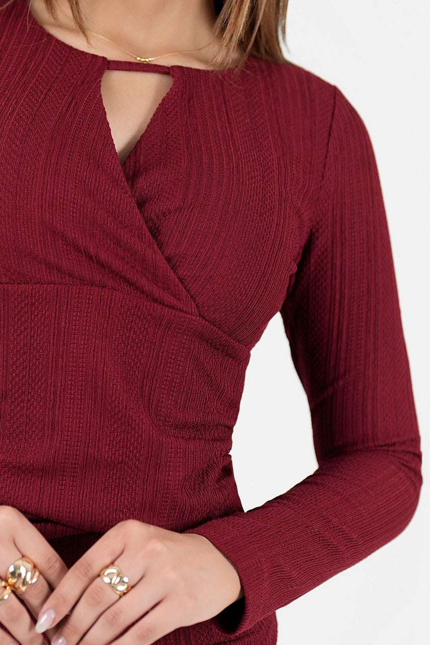 Polo manga larga en jacquard labrado