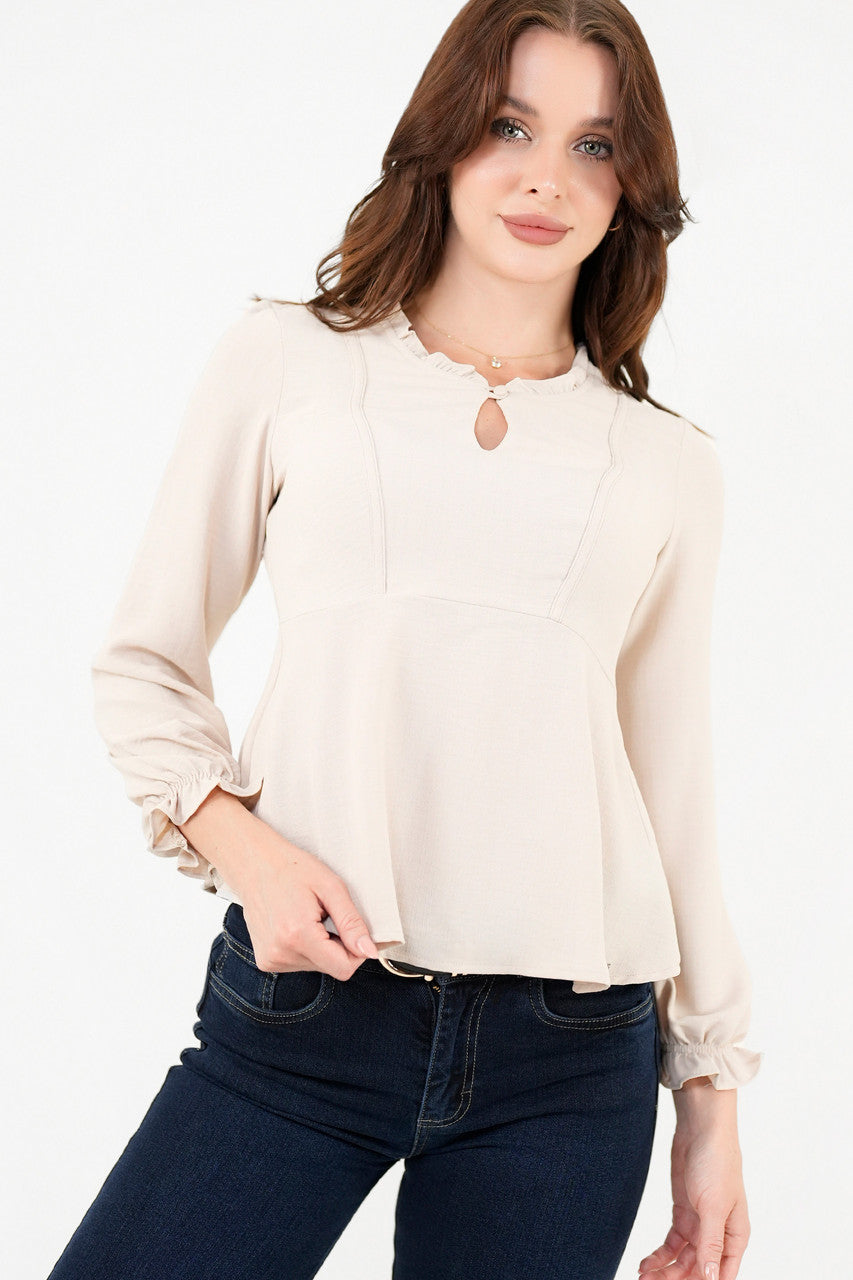 Blusa manga larga con Bobo en el escote