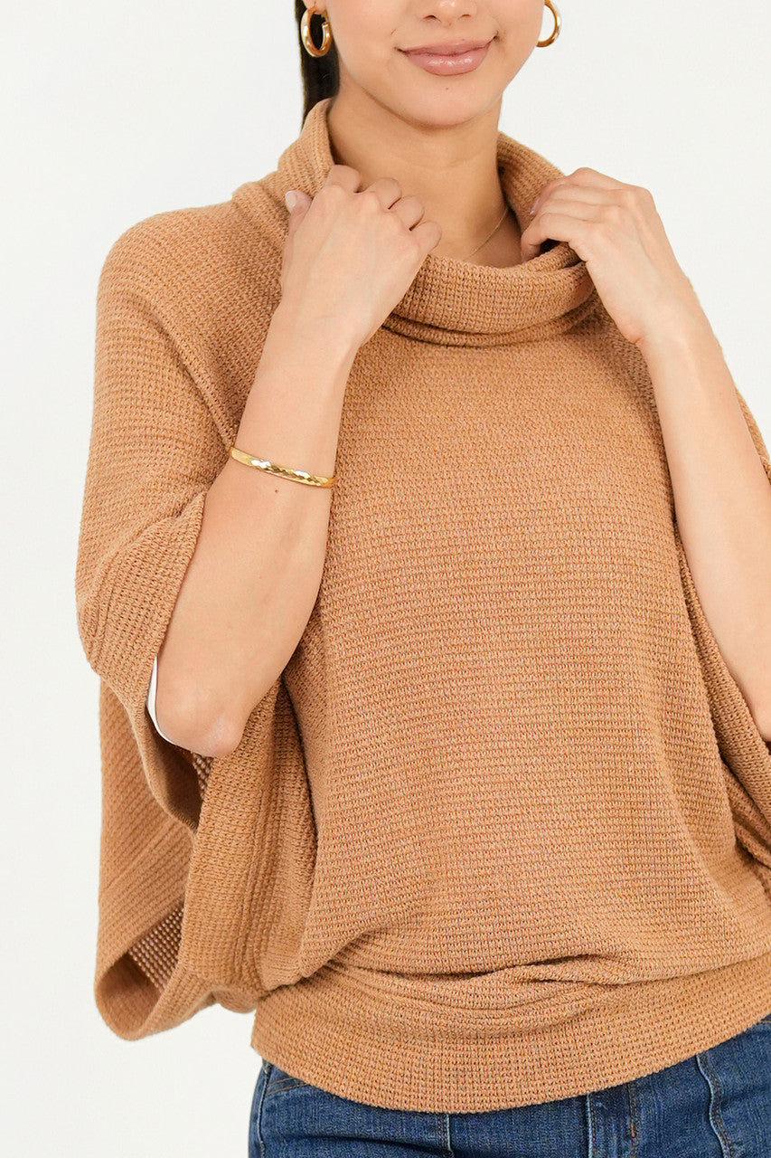 Poncho cuello alto