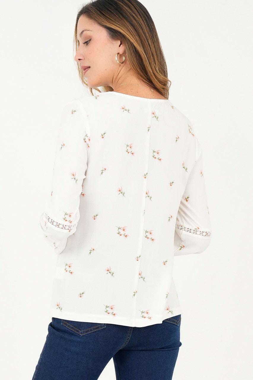 Blusa manga larga con corte y bolillo calado