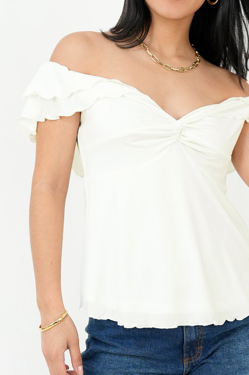 Polo off shoulder nudo en escote