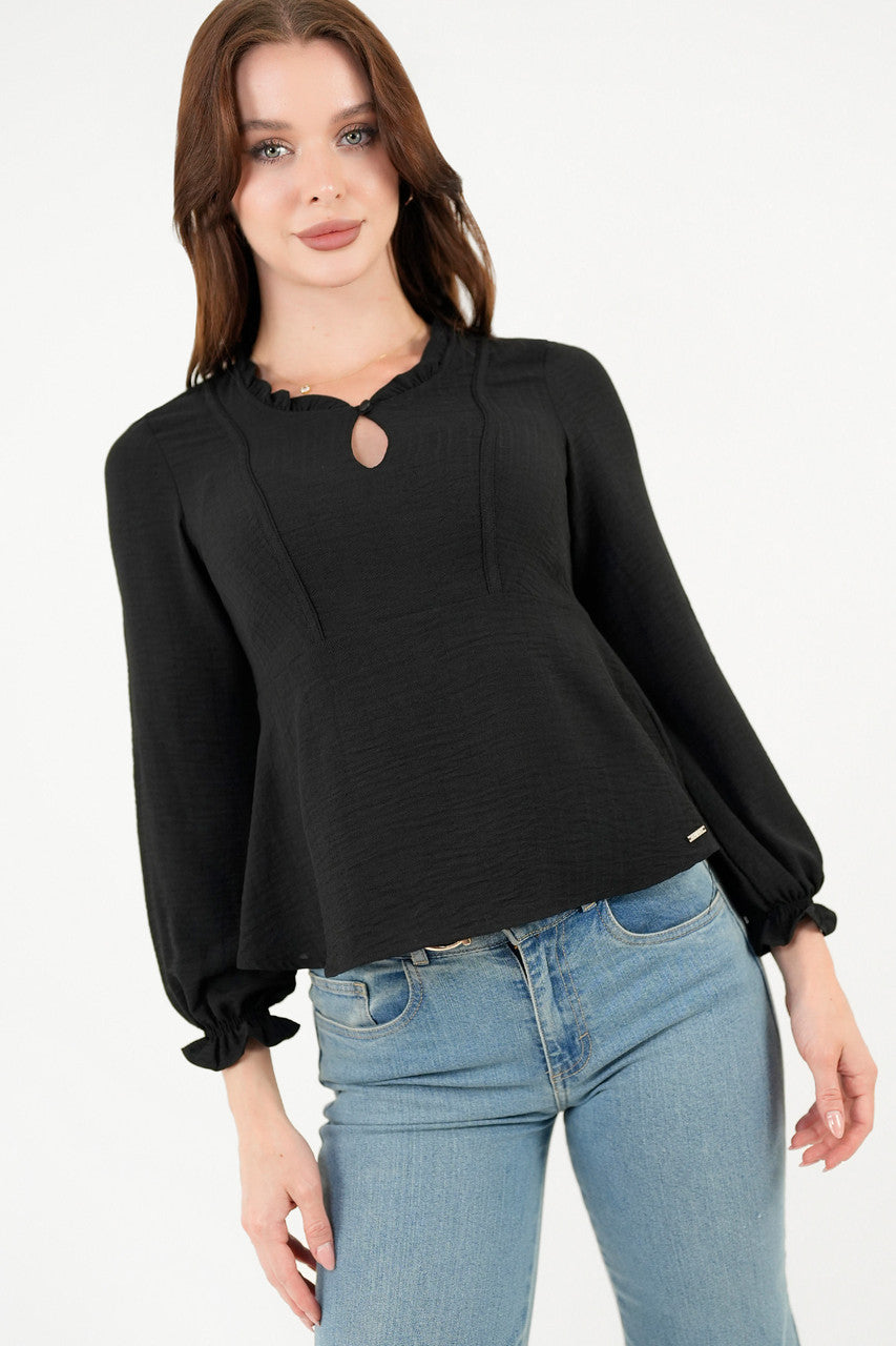 Blusa manga larga con Bobo en el escote