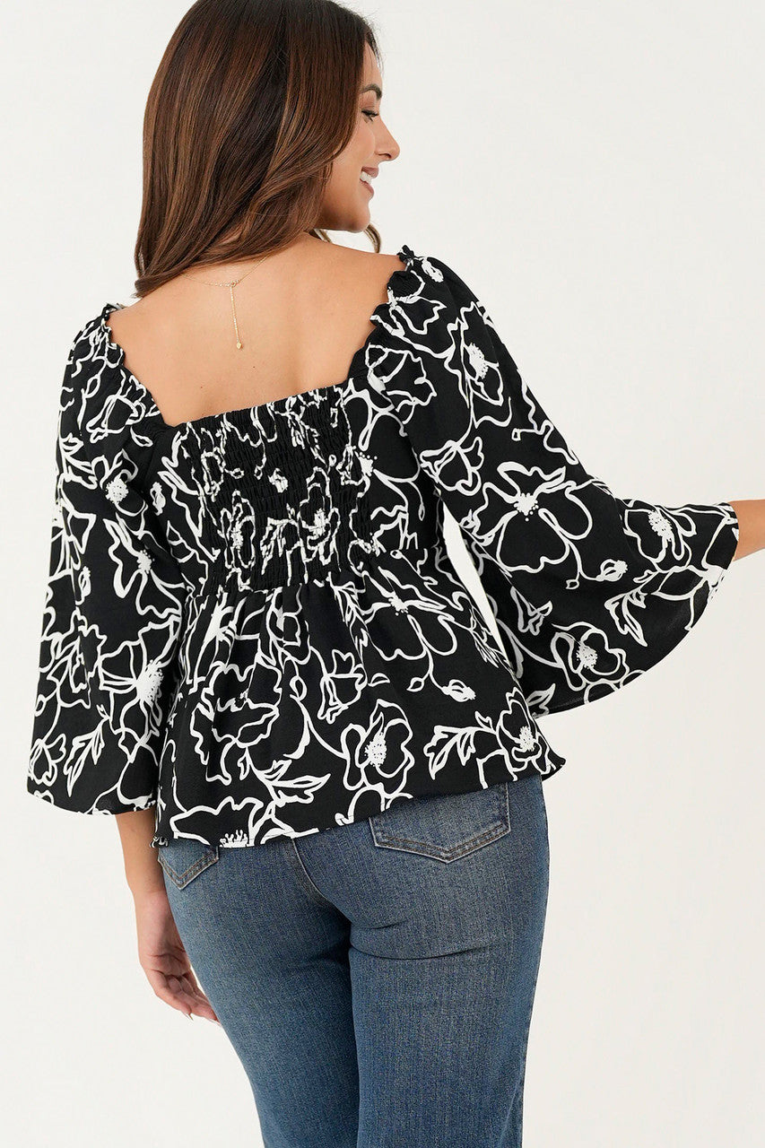 Blusa manga 3/4 acampanada escote corazón