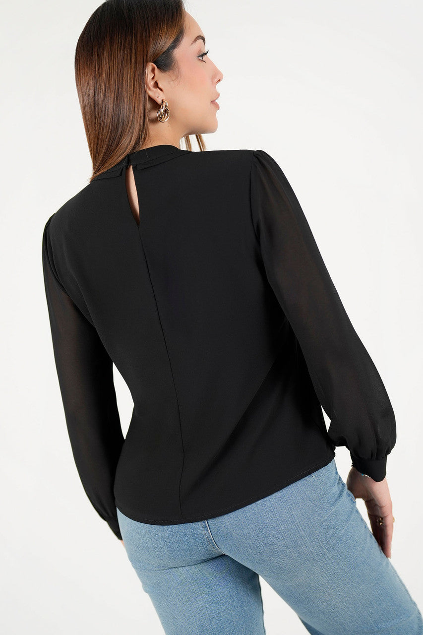 Blusa manga larga con cuello neru
