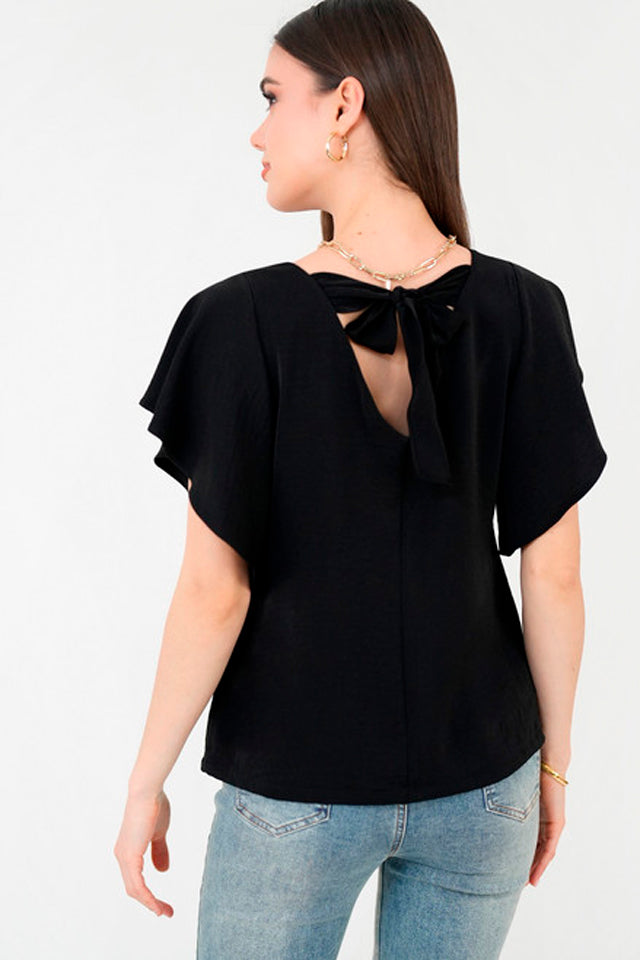 Lazos statement: cómo convertir un simple detalle en el protagonista del outfit