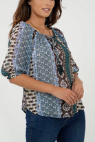 Blusa Manga Abullonada 3/4 Escote Bote