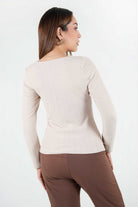 Polo manga larga en jacquard labrado