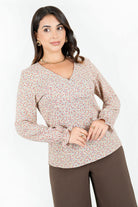 Blusa manga larga en seda corrugada con escote V