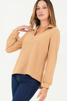 Blusa manga larga cuello sport