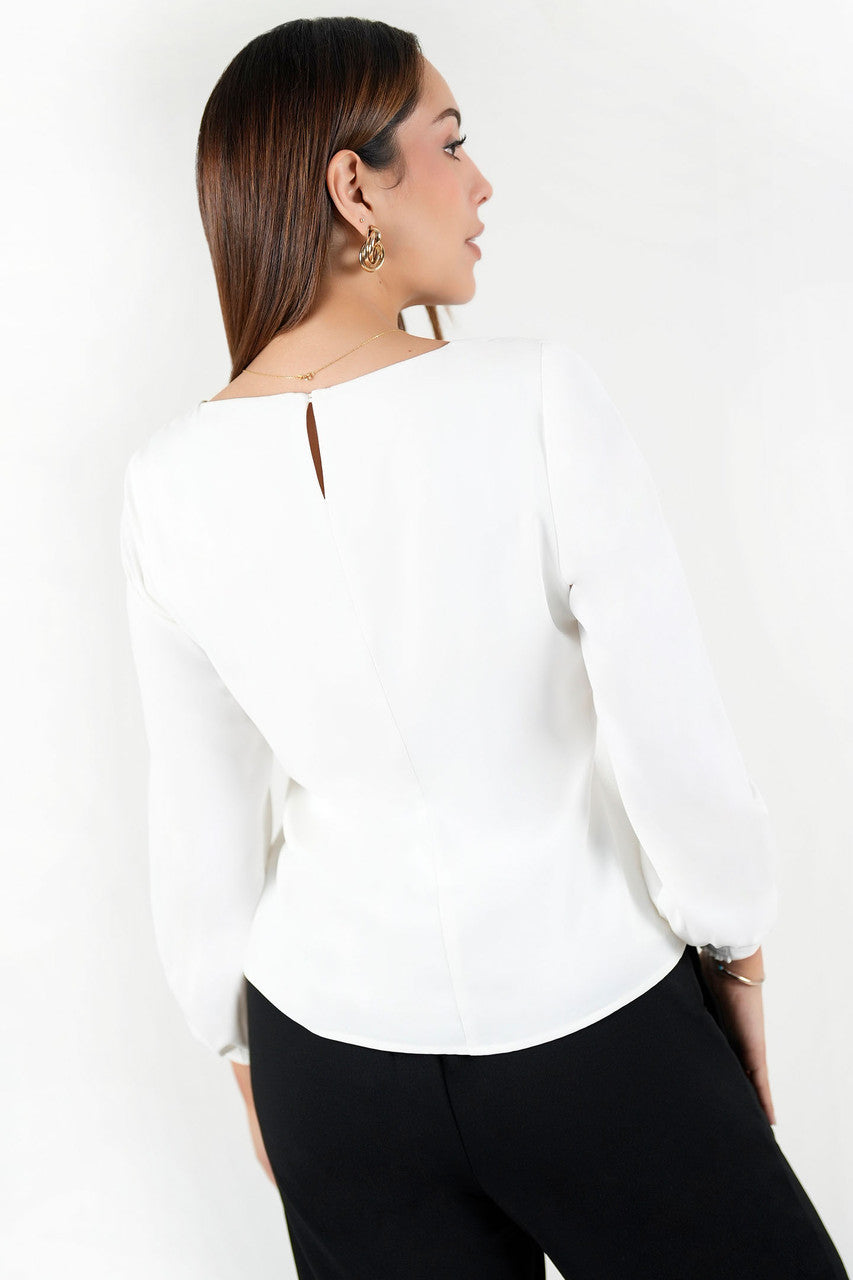 Blusa manga larga en seda con escote ojal