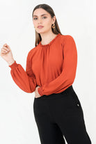 Blusa manga larga en gasa con detalle recogido