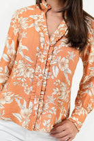 Blusa manga larga con pechera camisera