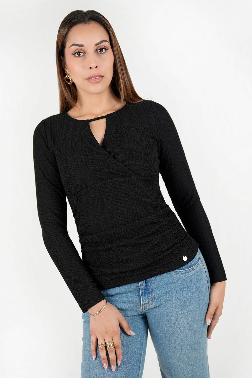 Polo manga larga en jacquard labrado