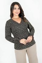 Blusa manga larga en seda corrugada con escote V