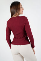Polo manga larga en jacquard labrado