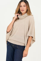 Poncho cuello alto