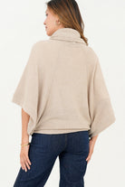 Poncho cuello alto