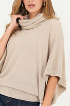Poncho cuello alto
