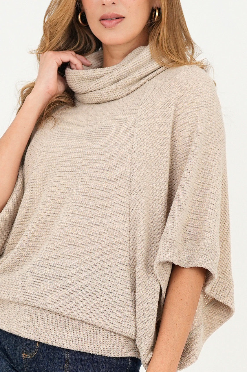 Poncho cuello alto