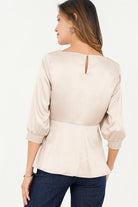 Blusa manga 3/4 escote ojal corte clásico