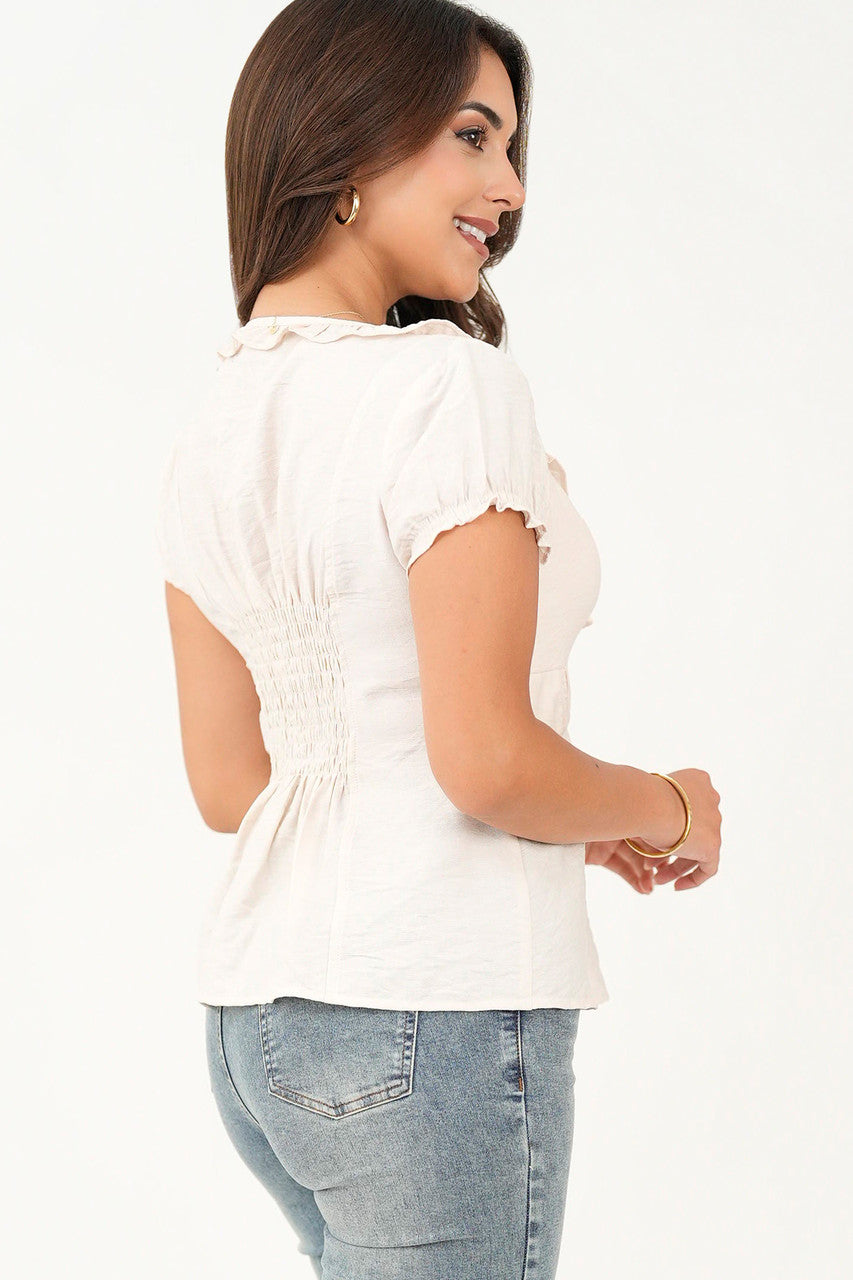 Blusa manga corta escote con bobito