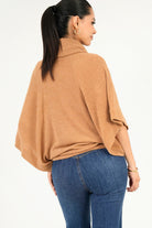 Poncho cuello alto