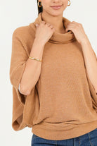 Poncho cuello alto