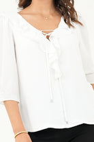 Blusa manga 3/4 escote con ruffle