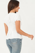 Blusa manga corta escote con bobito