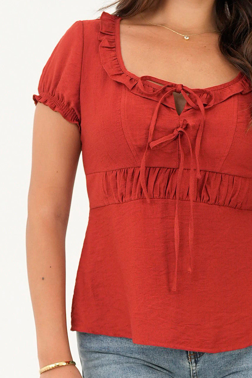 Blusa manga corta escote con bobito