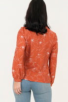 Blusa manga larga abertura lagrima