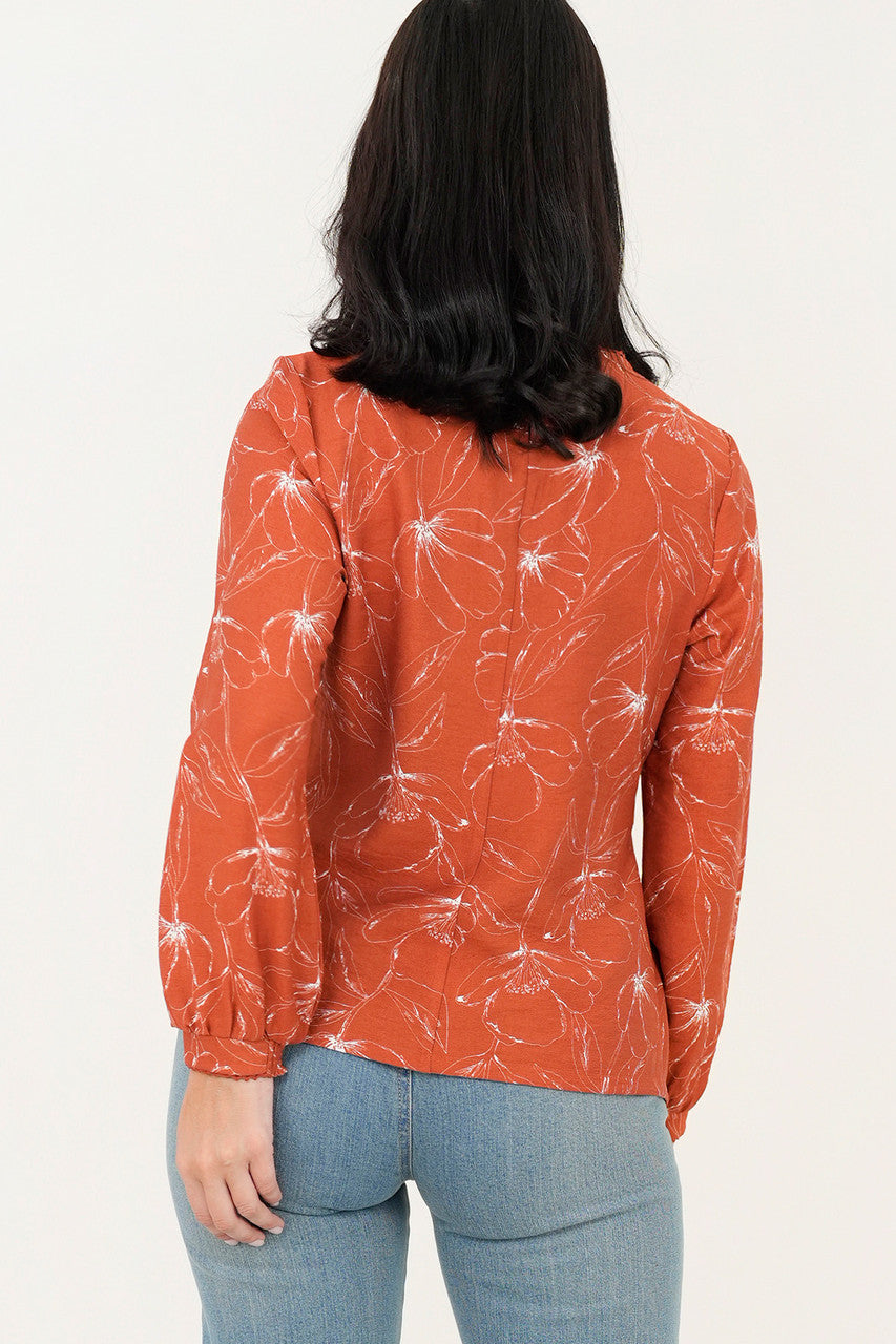 Blusa manga larga abertura lagrima