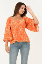 Blusa manga 3/4 acampanada escote corazón