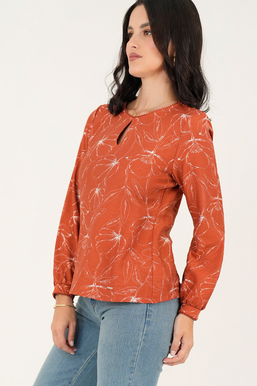Blusa manga larga abertura lagrima