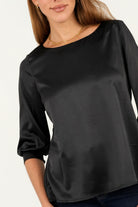 Blusa manga 3/4 escote ojal corte clásico
