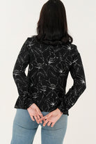 Blusa manga larga abertura lagrima