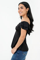 Polo off shoulder nudo en escote