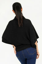 Poncho cuello alto