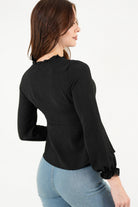 Blusa manga larga con Bobo en el escote