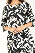 Vestido manga 3/4 escote ojal