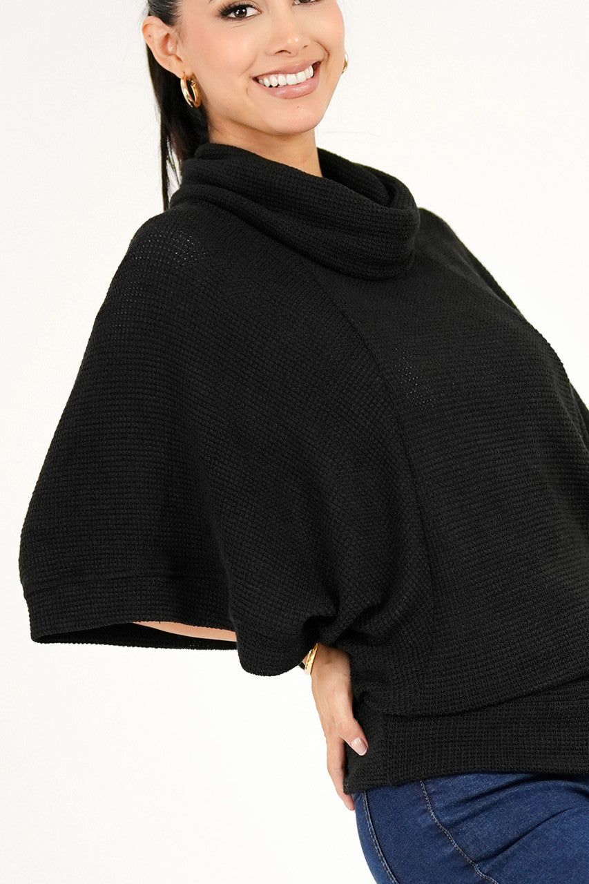 Poncho cuello alto