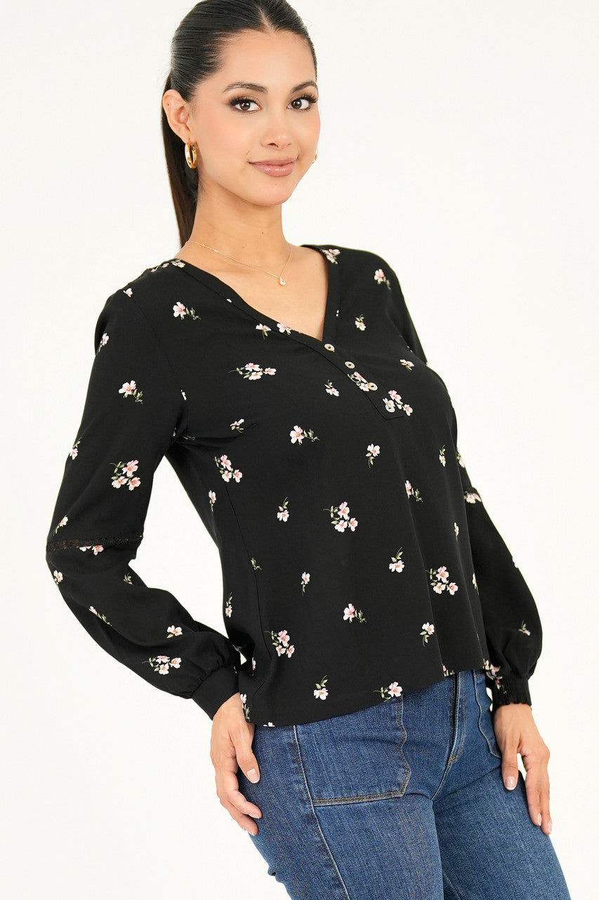 Blusa manga larga con corte y bolillo calado